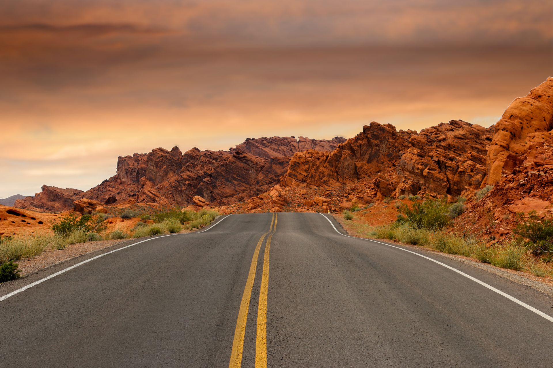 Highway stretching into the distance at golden hour
