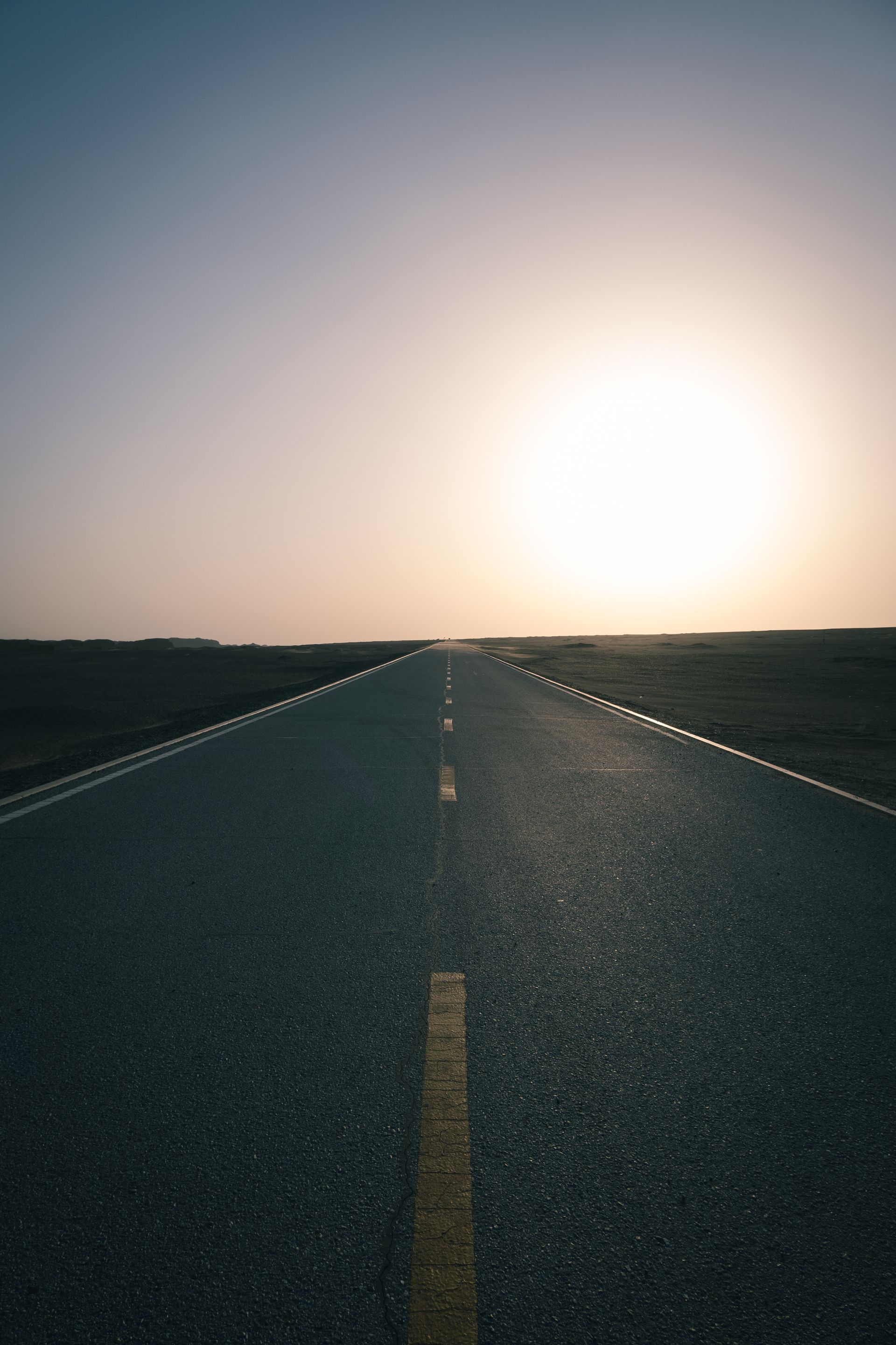 Open interstate highway at dusk, representing the freight routes CR Legacy Line dispatches across
